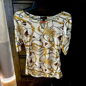 Cute top. 3/4 sleeve. Size small.